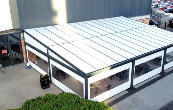 Spaceshade outdoor dining canopy with retractable blinds installed