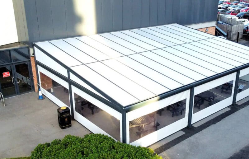 Spaceshade outdoor dining canopy with retractable blinds installed